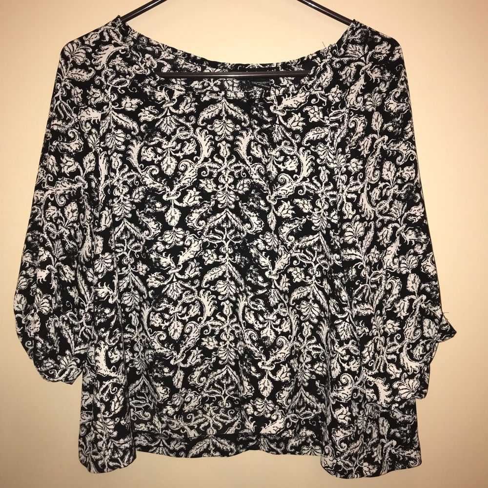 Black patterned top.